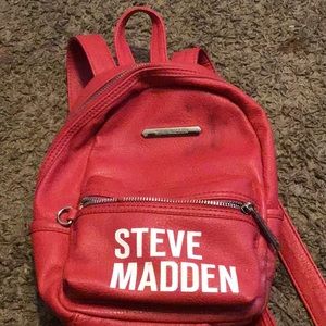 Steve Madden bag one stain in a broken zipper